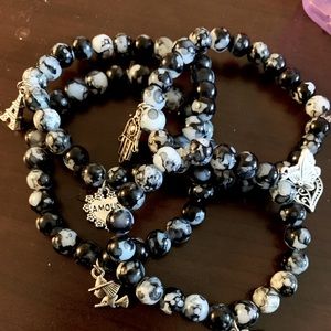Black and grey glass beads with charms
